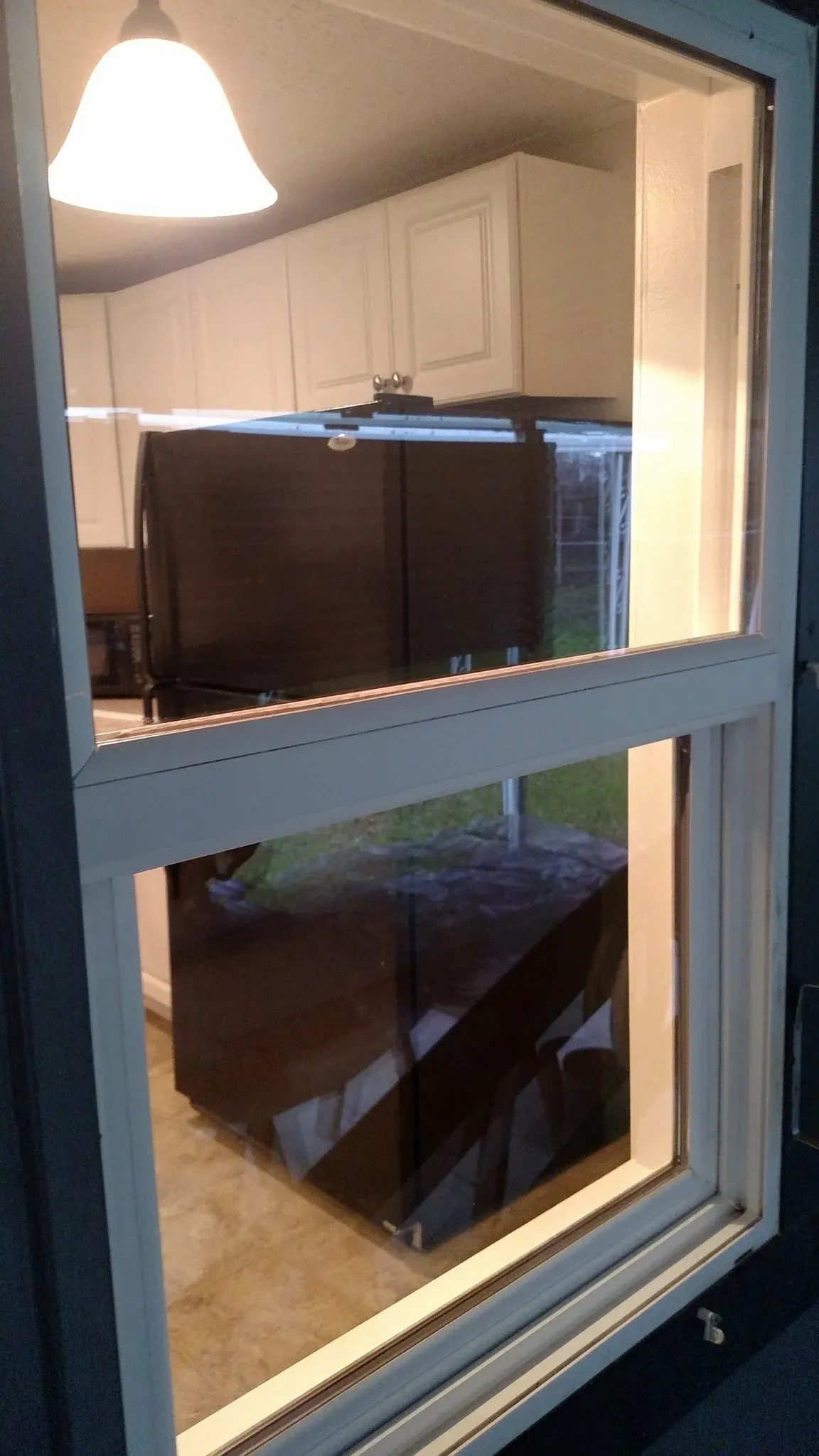 A bright, streak-free window after Two Guys Window Cleaning service in Redding, CA