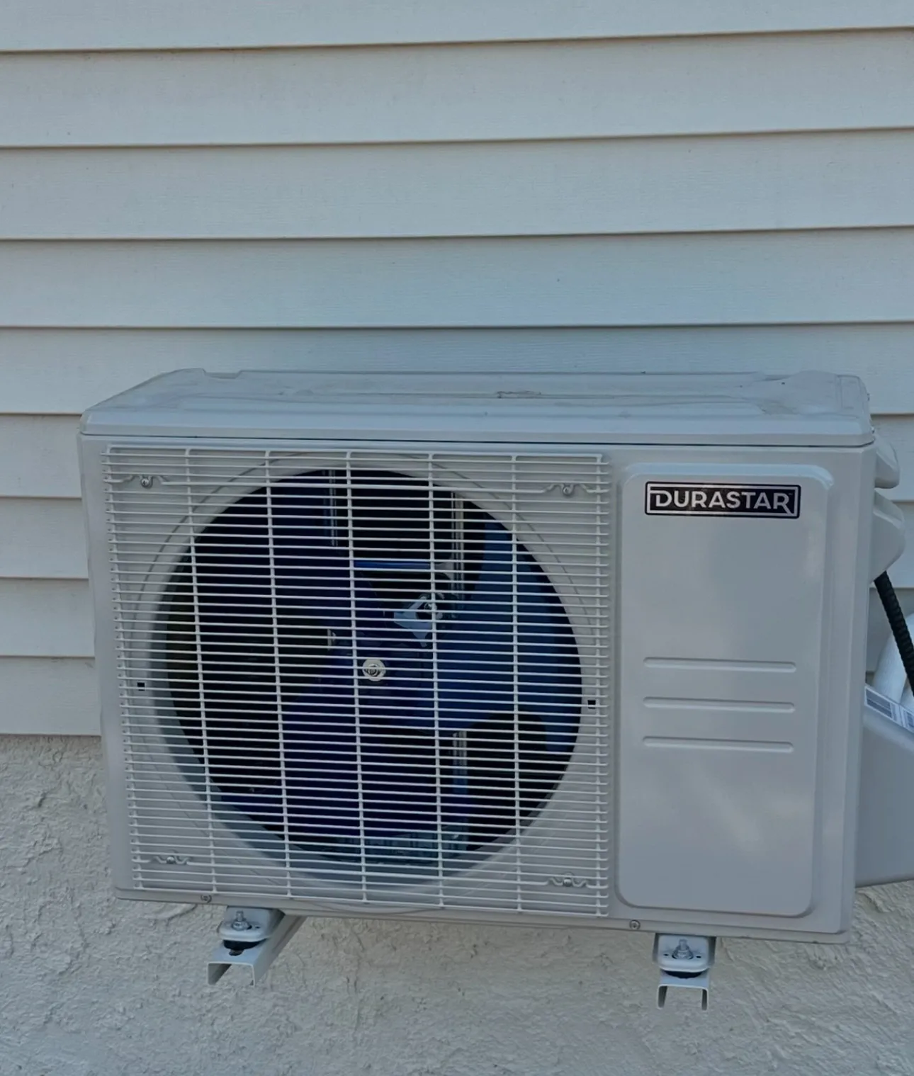 Technician performing air conditioning, heat pumps, and heating maintenance in a Murfreesboro TN.
