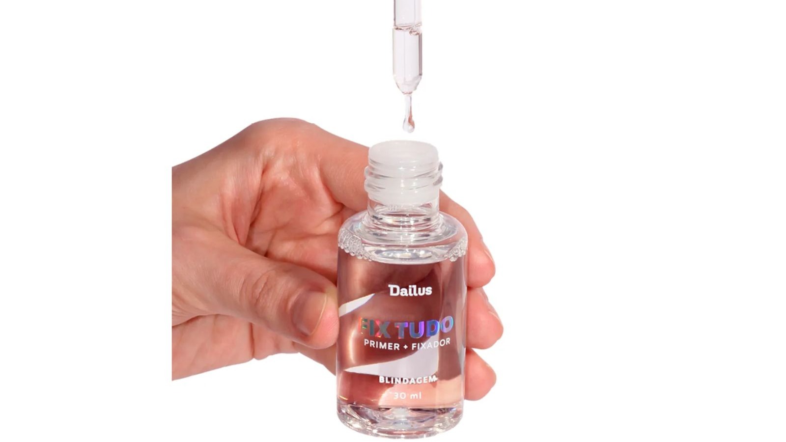 M&atilde;o segura frasco Dailus Fix Tudo; um conta-gotas dispensa l&iacute;quido, gota caindo