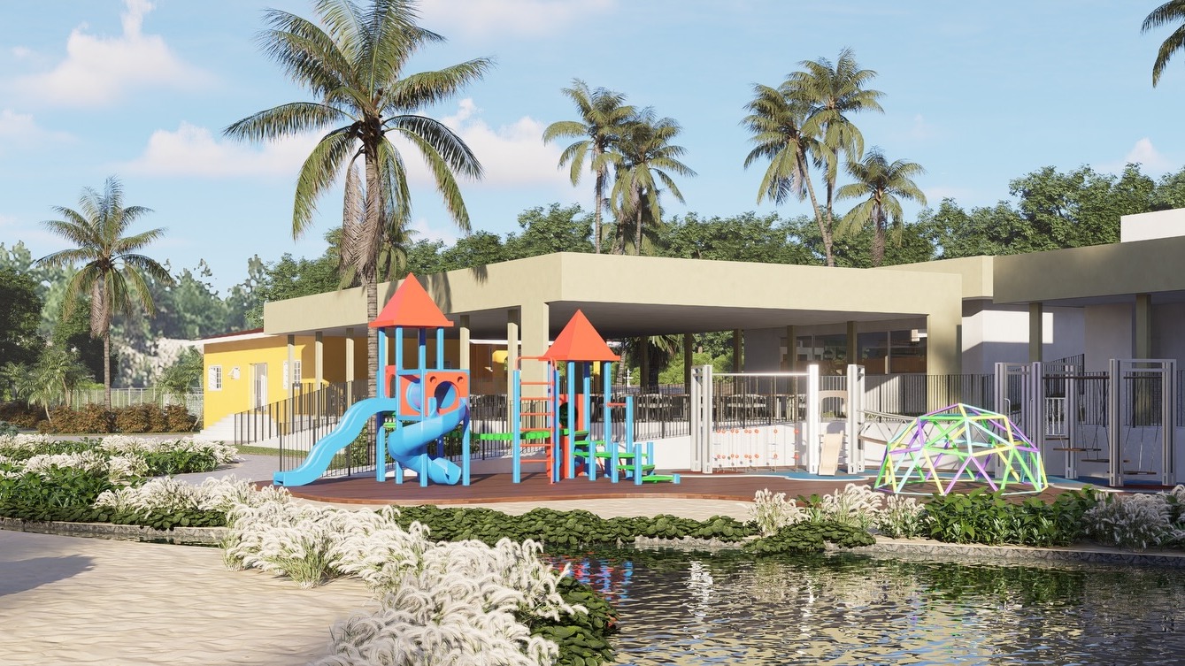 Parque infantil colorido com escorregadores, estrutura de escalada, domo e lagoa em área verde