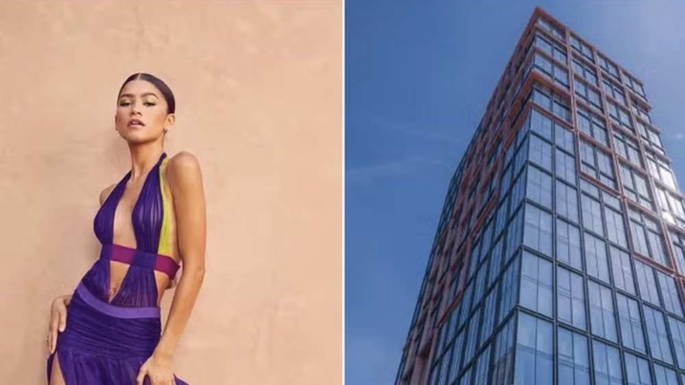 Zendaya em vestido roxo e um prédio moderno de vidro e metal sob céu azul