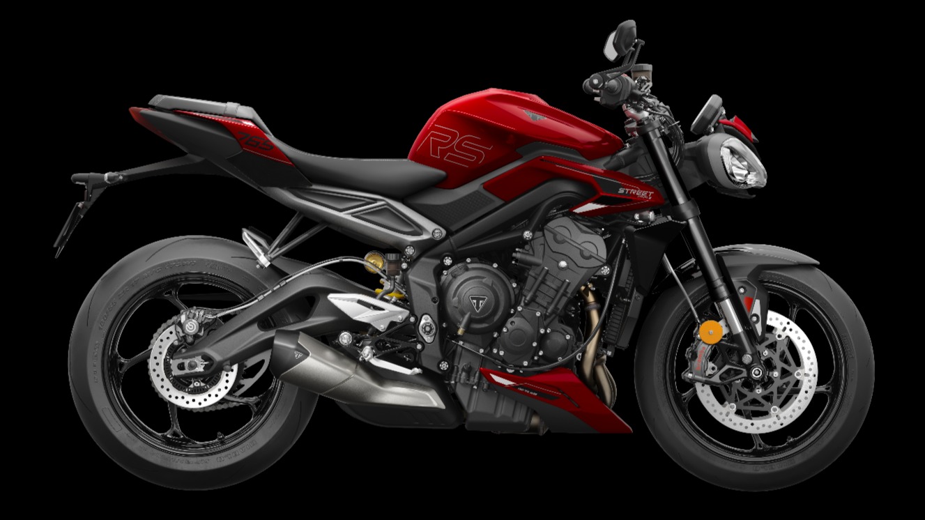 Motocicleta Triumph Street Triple 765 RS vermelha com detalhes pretos, vista lateral em est&uacute;dio