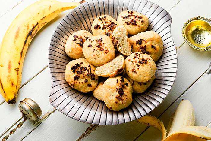 Chickpea treats for dogs are placed in a metal bowl.