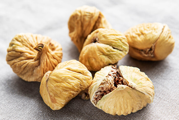 Pieces of dried fig fruits.