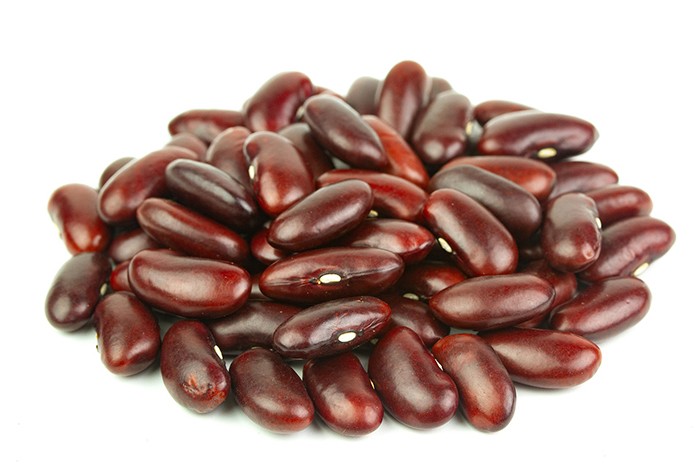 A handful of raw kidney beans.