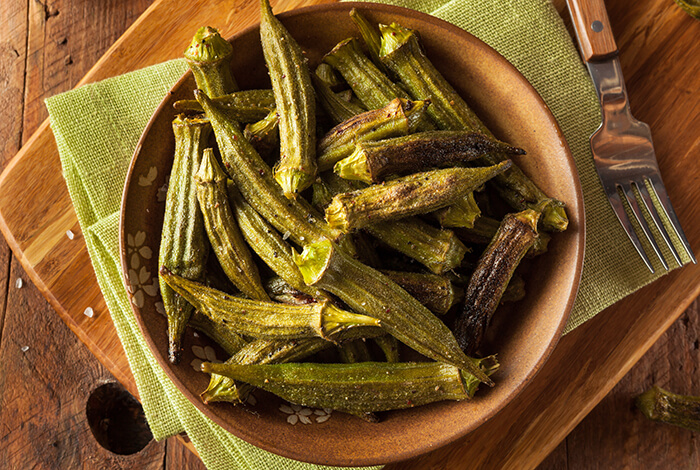 A bowl full of fried okra.