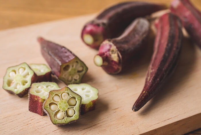 Purple-colored okra sliced into small pieces.