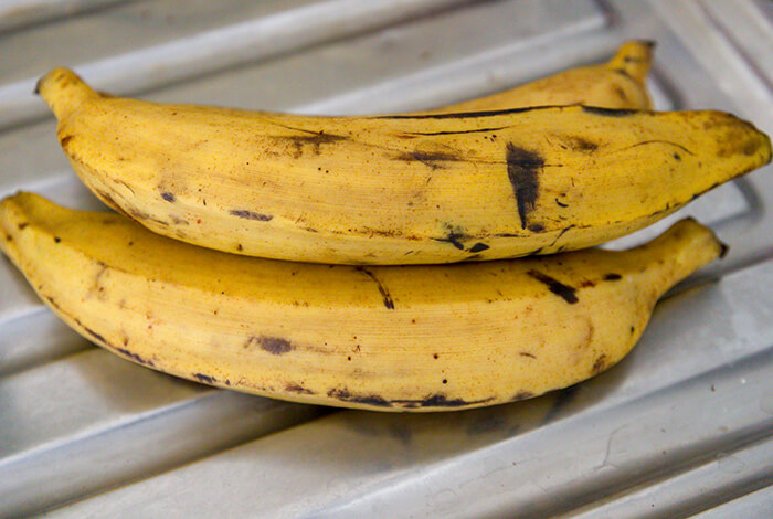 Three pieces of plantain on a table.