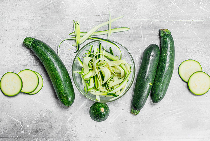 Pieces of summer squash cut into thin slices
