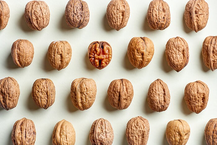 Uncracked walnuts lined up nicely.