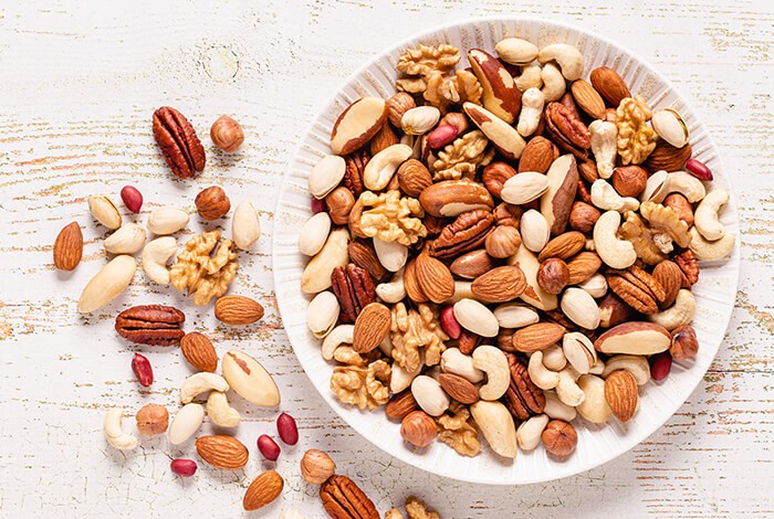 Different types of nuts that are safe for dogs.