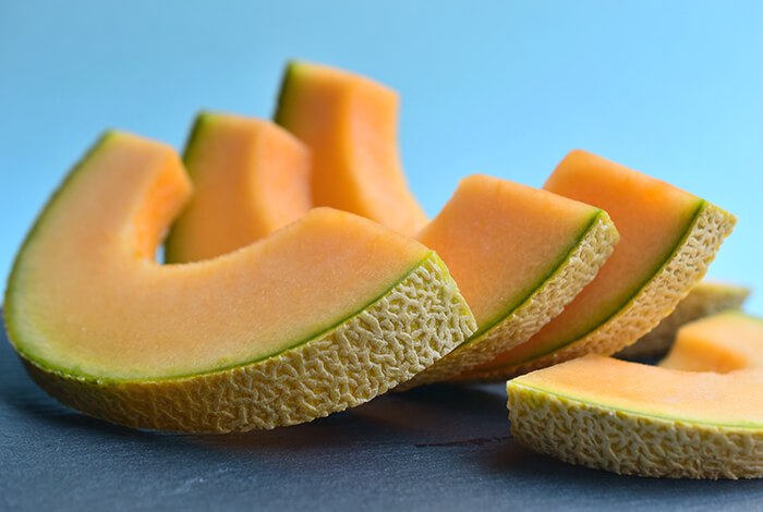 A closeup look at sliced cantaloupes.