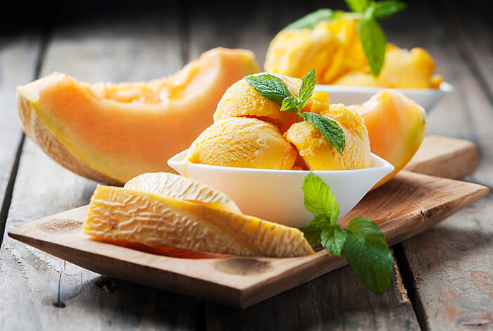 Bowls of cantaloupe ice cream.