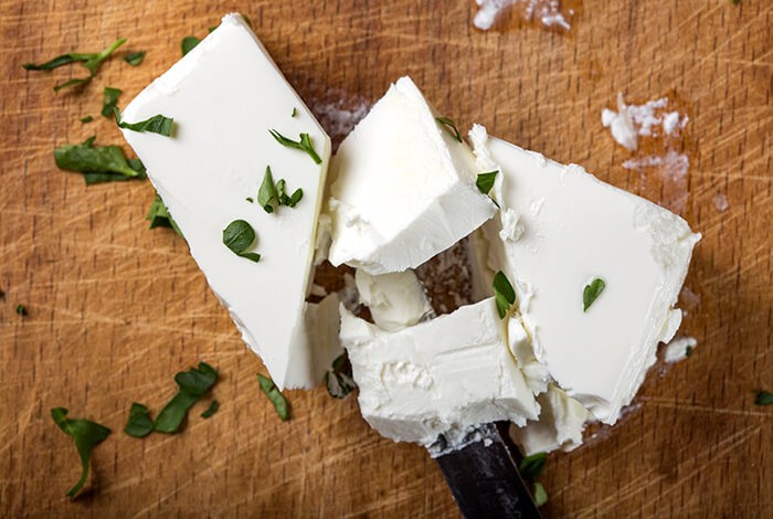 Feta cheese sprinkled with herbs.