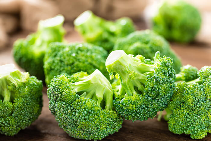 Pieces of raw broccoli for dogs.
