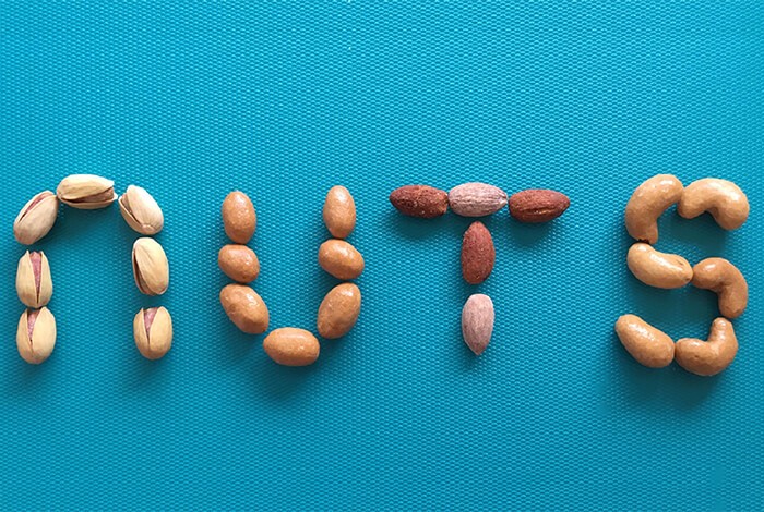 Different types of nuts spelled nuts.