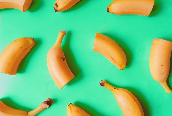 Banana slices scattered on a surface.