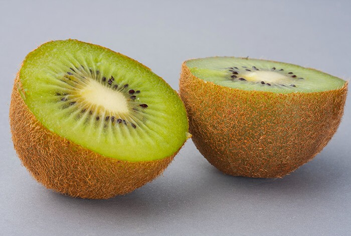 A kiwi sliced in half.
