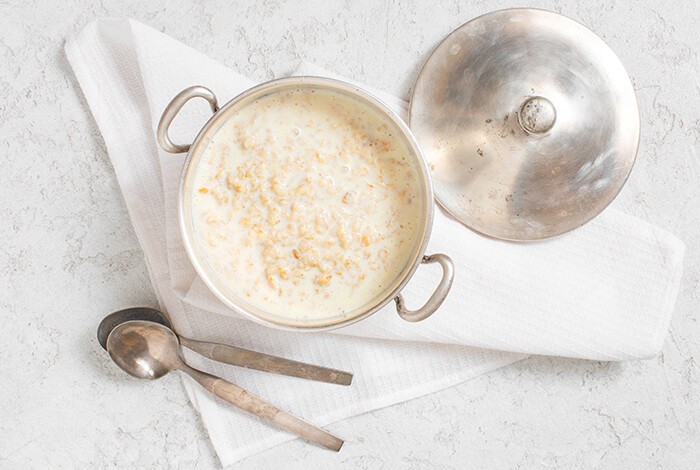 A pan full of cooked oatmeal.