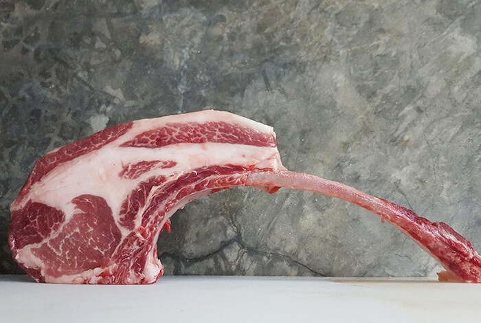 A piece of raw pork rib.