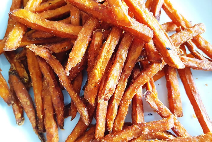 Seasoned fried sweet potato fries.