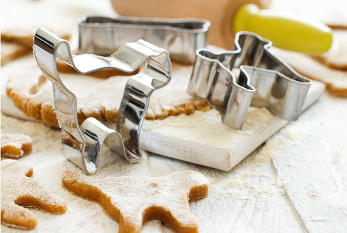 Pet-shaped cookie cutter and dough.