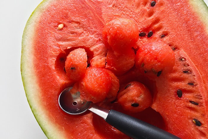 Watermelon balls and a melon baller.