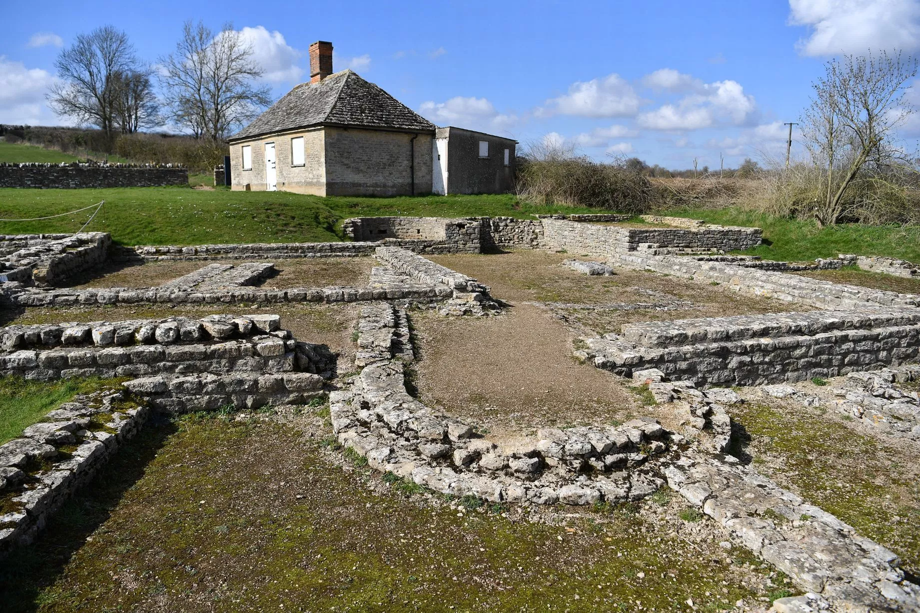 Fog-shrouded ruins of a Roman villa in Britain