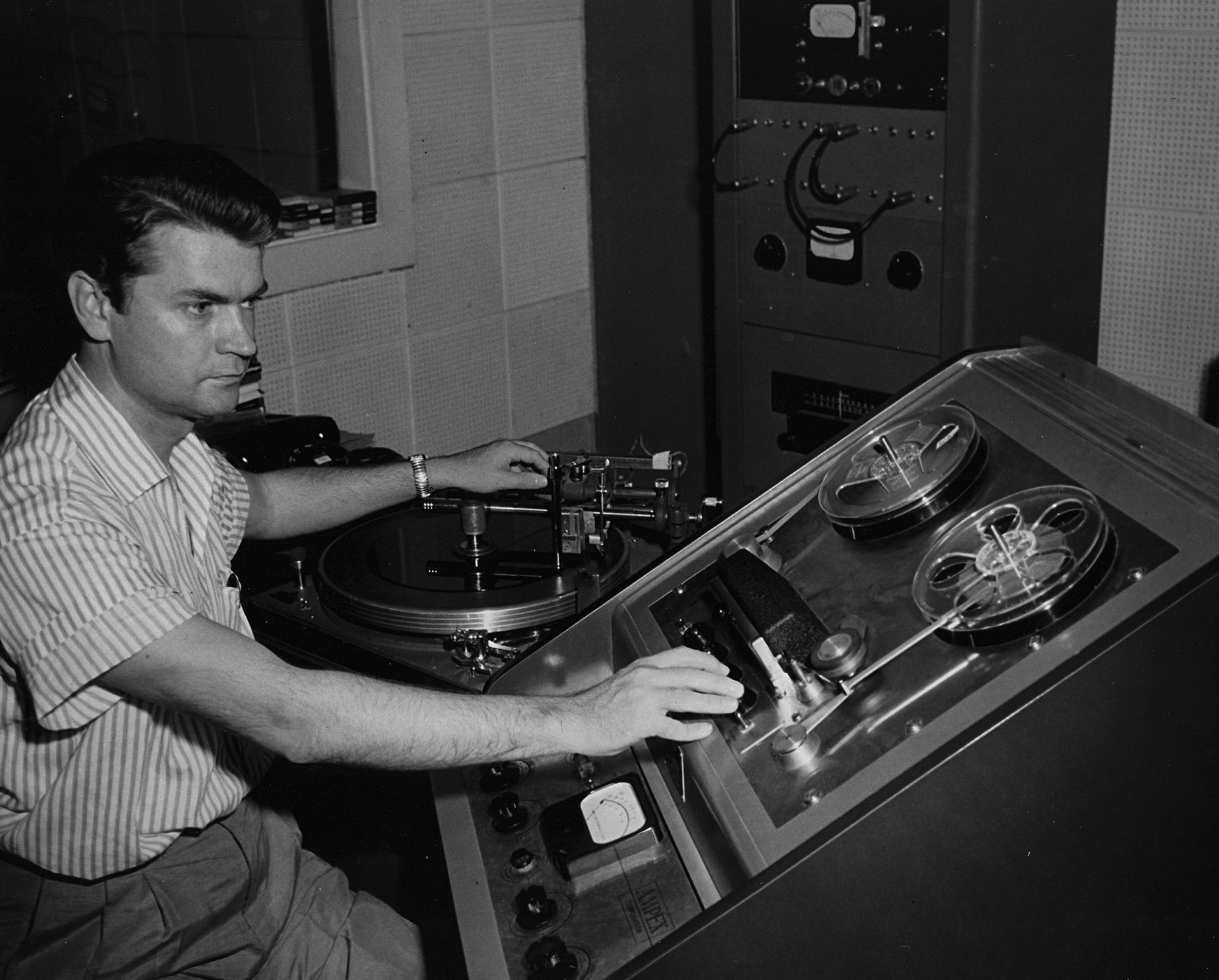 Sam Phillips in the tiny control room at 706 Union Avenue—Sun’s solar flare.