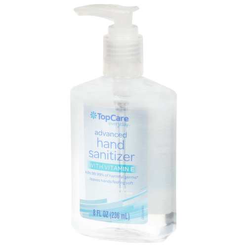 Alcohol Gel Hand Sanitizer In Kitchen With Garlic And Onion On