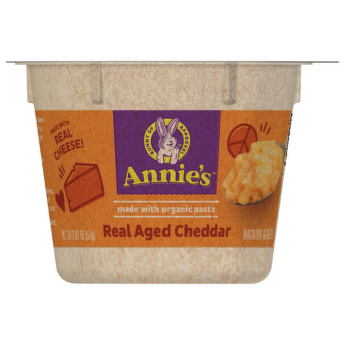 Annie's Real Aged Cheddar Microwave Mac and Cheese Cup makes family dinner and kids snack time easy and delicious. Each Annie's mac and cheese cup offers organic pasta and flavorful aged cheddar cheese with a creamy, dreamy taste that is impossible to resist. Annie's microwavable mac and cheese is crafted with care and made with real cheese from cows not treated with rBST*, offering quality ingredients in every cup. With no artificial flavors or synthetic colors, you can feel good about serving and enjoying a tasty and wholesome cup of Annie's mac n cheese. Annie's macaroni and cheese cups are perfect for lunchtime, dinnertime or anytime you're in the mood for something downright delicious. This microwave mac and cheese cup is ready in minutes, making it a great-tasting adult and kids food option for busy bunnies and families on the go. Simply remove the cup lid, add cold water to the fill line and stir. Microwave on high for two minutes, mix in the cheese packet and enjoy alone or paired with a kid-friendly protein like chicken nuggets. Easily store this convenient adult and kids mac and cheese cup in a pantry or throw it into a backpack for an on-the-go snack. Annie’s macaroni and cheese is an official Box Tops For Education participating product. Download the Box Tops App to learn more and start earning cash for schools in need today. Annie's Homegrown is devoted to spreading goodness through kindness to the planet and creating tasty foods for everybunny. *No significant difference has been shown between milk derived from rBST-treated and non rBST-treated cows.