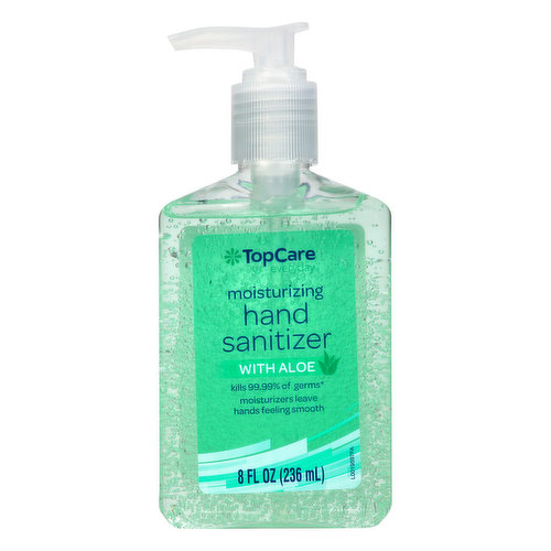 Alcohol Gel Hand Sanitizer In Kitchen With Garlic And Onion On