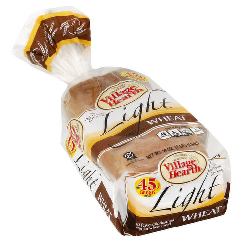 Only 45 calories per slice. No high fructose corn syrup. 1/3 fewer calories than regular wheat bread. Per 1 Slice Serving: 45 calories; 0g sat fat (0% DV); 110 mg sodium (5% DV); 1 g sugars. We can all make a difference (Even the twist tie that we used on this package is certified as completely biodegradable)! Plastic bags are recycled into many different products. Most plastic bags are recycled into composite decking but can also be reprocessed into post consumer resin which can be recycled into a variety of products such as new bags, pallets, containers and crates. Go Green: Please recycle me with your grocery store bags. Village Hearth Light Wheat Bread has a full slice and is baked with all of the good taste of regular Village Heart, however, the Light Wheat Bread contains fewer calories and is higher in total fiber. Village Hearth is a family owned company with a proud heritage dating back to the 1800s! Our entire line of breads is made with only the finest ingredients. Try the other delicious Village Heart breads. You'll find them in the Village Hearth section at your favorite store. Village Hearth: Always healthy for you. This Product Does Not Contain: High fructose corn syrup; Artificial colors/dyes; Bleached flour; L-cysteine; Cholesterol; Azodicarbonamide (ADA); Trans fats. Village Hearth Light Wheat Bread contains 45 calories and 0.5 grams of fat per 0.80 oz. slice (23 grams) compared to regular wheat bread which contains 70 calories and 1.0 grams of fat per 0.80 oz. slice (23 grams). www.panogold.com.