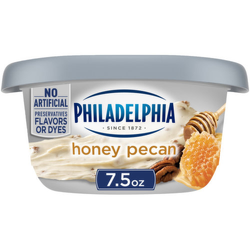 Philadelphia Honey Pecan Cream Cheese Spread is made with fresh milk and cream plus roasted pecans and sweet honey. Our spreadable cream cheese has no artificial preservatives, flavors or dyes. It's sweet, creamy and perfect for spreading on your warm, toasty morning bagel. Each 8-ounce honey pecan cream cheese spread tub is resealable to lock in flavor.