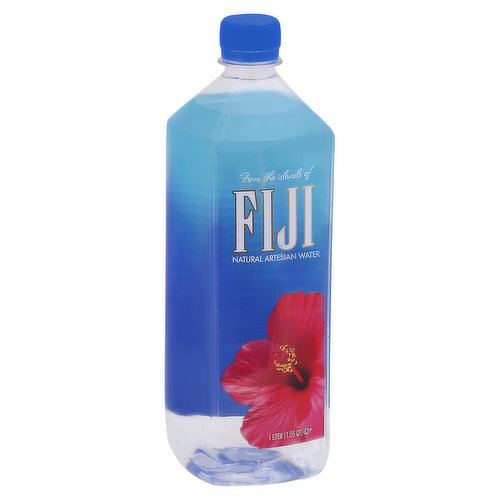 From the islands of Fiji. Natural Electrolytes. There's electrolyte-enhanced water. And there's the smarter choice: FIJI Water. Not only does FIJI have significantly more electrolytes than other brands, ours are naturally occurring. How? As tropical rain slowly filters through volcanic rock it gathers the electrolytes and minerals that give FIJI Water its signature soft, smooth mouthfeel. How smart is that? Earth's finest water. Please recycle.