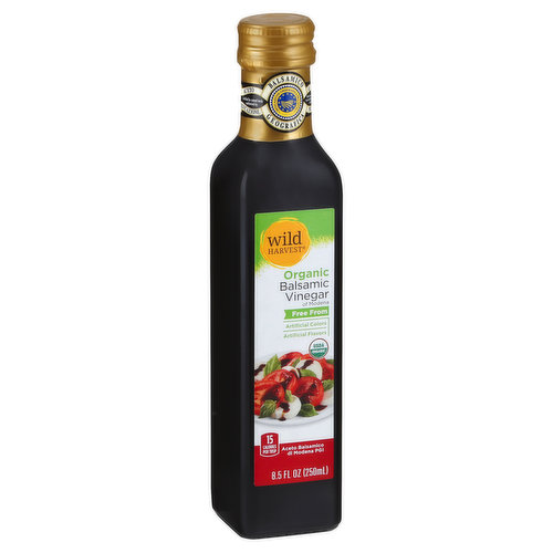 Balsamic vinegar of Modena. Free from: artificial colors; artificial flavors. USDA Organic. Gluten free. EU organic. Controlled and certified by Organismo di Contollo. 15 calories per tbsp. mywildharvest.com. Product of Italy.