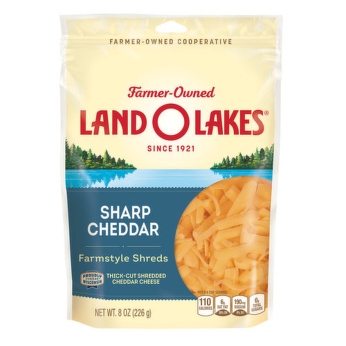 With Land O Lakes Sharp Cheddar Cheese Farmstyle Shreds, you can make any breakfast, lunch, dinner or snack even more delicious. This shredded cheddar cheese gives irresistibly sharp flavor to your scrambled eggs, salads, pastas, breads and more. The farmstyle cheddar shreds are thick-cut to add even more cheesy goodness to your favorite dish. Whether you like to snack straight from the bag or want a quick and easy way to upgrade the flavor of any homemade dish, Land O Lakes Shredded Sharp Cheddar Cheese is the perfect cheesy companion. These cheddar cheese shreds melt with ease so you never have to wait long before you can enjoy your delicious, cheesy meal. Land O Lakes Sharp Cheddar Shredded Cheese is an excellent choice in stuffed peppers, layered in cheesy lasagna or sprinkled over garlic bread to make it even more cheesy. Every purchase supports farmer-owners in communities across the country. Land O Lakes Sharp Cheddar Cheese Farmstyle Shred — Eat It Like You Own It.