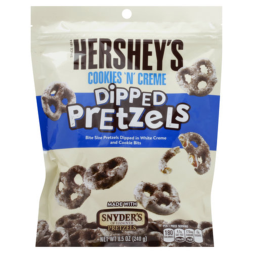 Bite size pretzels dipped in White Creme and Cookie Bits. Since 1894. Bite Size Snyder's of Hanover Pretzels are dipped in creamy Hershey's White Creme and Sprinkled with Cookie Bits. Grab a handful and get snacking! Made with Snyder's of Hanover pretzels. Per 7 Pieces Serving: 180 calories; 4.5 g sat fat (23% DV); 170 mg sodium (7% DV); 13 g sugars. Questions or comments? www.askhershey.com or 800-468-1714.