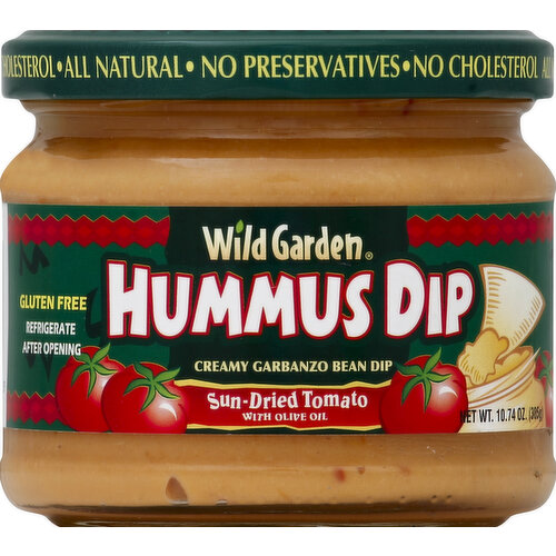 With olive oil. Creamy garbanzo bean dip. Gluten free. No preservatives. No cholesterol. All natural. www.wildgarden.biz. Make everyday a party! Tasty Wild Garden Hummus Dip is a perfect topping for chips, pita bread, or spread on your favorite sandwich. An all natural, healthy alternative that will satisfy even the most discriminating vegetarian. Add garlic, lemon or olive oil taste. www.wildgardenhummus.com. Product of Jordan.