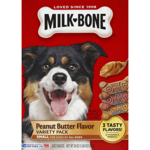 Peanut butter flavor. Bacon & peanut butter flavor. Peanut butter & honey flavor. For dogs of all sizes. Naturally & artificially flavored. Loved since 1908. 3 tasty flavors! 12 vitamins & minerals. Easy open tear strip! Peanut butter flavored goodness in 3 tasty flavors. Milk-Bone Peanut Butter Flavor Variety Pack features the same teeth cleaning and vitamin-fortified goodness of Milk-Bone Original dog snacks in 3 delicious Peanut Butter Flavors your dog will love. Prepared with care by the makers of Milk-Bone dog snacks, these tasty treats will give your dog the simile, genuine joy that your dog gives you every day. 3 Delicious Peanut Butter Flavors: Comes in a variety of peanut butter, bacon & peanut butter, and peanut butter & honey flavors that your dog loves. 12 Vitamins & Minerals: Fortified to help keep your dog at his best. Helps Clean Teeth & Freshen Breath: Crunchy texture helps remove plaque and tartar build-up. Milk-Bone Dog Snacks Heritage: We made our first biscuit over a century ago in a little bakery on the Lower East Side of New York City. We still use the same high quality and wholesome ingredients to make the original bone-shaped dog treat, and after more than 100 years, we still say, it's good to give! You're giving more than just a healthy & tasty treat - The makers of Milk-Bone dog snacks believe in giving back. That's why since 1997, a portion of every Milk-Bone dog snacks purchase goes towards providing service dogs to children and adults with physical disabilities and special needs. Visit milkbone.com to see how you can help us change the lives of others in need. Calorie Content (calculated): Metabolizable Energy (ME) 3280 kcal/kg; 28 kcal/treat. If you have any questions about Milk-Bone dog snacks, please call 1-888-Milkbone (645-5266), weekdays. Please include the product manufacturing code in consumer correspondence. Sustainable Forestry Initiative: Certified sourcing. www.sfiprogram.org. We support the Sustainable Forestry Initiative which integrates the protection of wildlife, plants, soils and water with a continuous fiber supply for future generations. This package is sold by weight, not by volume. It contains full net weight indicated. If it does not appear full when opened, it is because contents have settled during shipping and handling. Produced in Buffalo New York, USA.