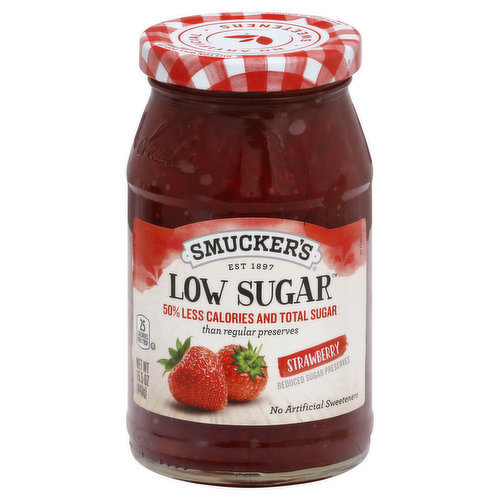 25 calories per 1 tbsp. Total sugar content has been lowered from 12 g to 5 g per serving. Calorie content has been lowered from 50 to 25 per serving. Low sugar. 50% less calories and total sugar than regular jelly. No artificial sweeteners. Est 1897. Made with real fruit juice and less sugar, so the whole family can enjoy the delicious fruit taste without all added sweetness. No artificial sweeteners or flavors. No high-fructose corn syrup. smuckers.com. Questions or comments 1-888-550-9555.