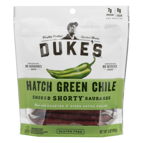 Made with roasted & diced hatch chiles. Per Serving: 7 g protein; 0 g total sugar. 7 g of protein with 0 g of total sugar per serving. Gluten free. Freshly Crafted. Smoked meats. Pork raised with no hormones added (Federal regulations prohibit the use of hormones in pork). Slow dried with no nitrites added (except for those naturally occurring in sea salt and celery powder). Real Ingredients Taste Better: I believe smoked meats should be made with real ingredients. Why? When you season and marinate fresh meats with whole, roasted, or diced ingredients from farms-not just dried spices-you get a fresher homemade flavor. It's not the easiest way to do things, or the quickest, but I think you'll agree you can taste the difference. Justin Duke Havlick. This batch was freshly crafted with roasted hatch chiles. It's no wonder why hatch chiles have become famous through the decades. The valley's cooler climate helps our local farmer friends produce chiles with an unforgettably-smoky and sweet taste. We roast them, dice them thick, and let the natural chile oils infuse the sausages with their signature hatch flavor. Fresh, never-frozen pork: We start with fresh, never frozen, pork that has never been given added hormones (Federal regulations prohibit the use of hormones in pork). Mesquite hardwood smoke: Smoked with 100% pure mesquite wood that boldly stands up to the sweet and rustic hatch chile flavor. Small batch care: Batch qty. 600. Hang-hung and slow-dried for days in small limited-size batches. No MSG. No gluten. No liquid smoke. No added nitrites (except for those naturally occurring in sea salt and celery powder). Craft. When we say it, we meant it. U.S. Inspected and passed by Department of Agriculture. dukesmeat.com.