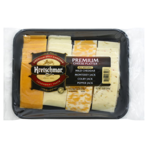 Mild Cheddar. Monterey Jack. Colby Jack. Pepper Jack. All natural. Cheese party tray. Premium Deli Cheeses. Legendary taste. Since 1883. Wisconsin cheese.