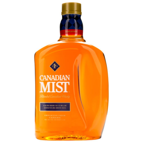 In 1968, Canadian Mist was born on the shores of Georgian Bay, Ontario, home to some of the freshest water in North America. Using top-quality grain, mellowed white oak barrels, and that pristine water, we created an easygoing classic whisky to be enjoyed by all.
Canadian Mists's distillery is Canada's oldest continuously owned and operated distillery. The distillery is located in Collingwood, Ontario, at the foot of the Blue Mountain and overlooks Georgian Bay.
Barley malt, rye, and corn are all sourced locally in Canada. The grains are ground, mixed with water and then mashed to extract their starches. Enzymes in the ground grain convert the starches to sugar, then this converted mash is sent to the fermenter. Yeast is added and fermentation begins. Sugar is converted to alcohol along with some trace flavor compounds known as congeners. The fermented grain mash is now called a "beer". This is distilled to separate the alcohol. Exposed to steam, the whisky is vaporized and sent to a condenser. The condensed vapor is now known as "high wine." This new whisky is mingled with water and steam through two columns, which separate out some of the congeners. The remaining congeners are what gives Canadian Mist its flavor and aroma. The base whisky is then reduced to 80 proof using pure water from the Georgian Bay. Placed into seasoned white oak barrels- mellowed just like the ones used for scotches -the whiskey is left to mature, not "age". Age doesn't determine quality, because some whiskies mature more quickly. The climate-controlled barrelhouses ensure constant maturing. The matured whisky is removed from the barrel at the peak of perfection. Barrels are selected and blended for a distinctive harmony of flavor and aroma. At last, the whisky is bottled proudly as Canadian Mist.
