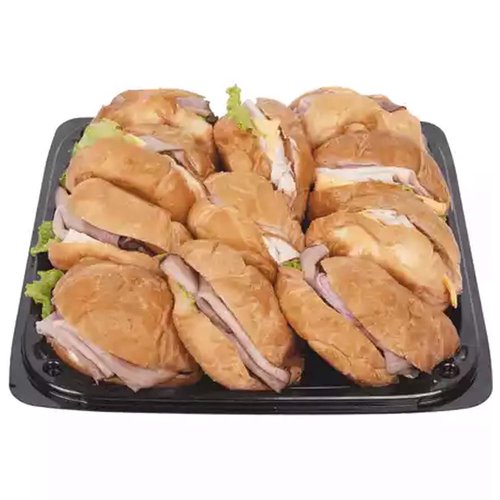 Mini croissants filled with assorted meats, cheeses and fresh lettuce.
Serves 6-8