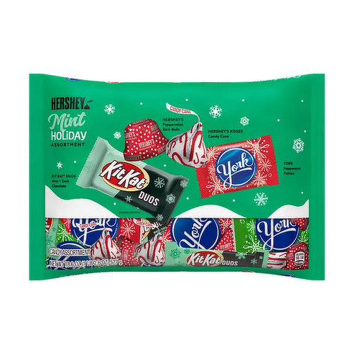 What is it about mint that makes the holiday season so merry and bright? If you didn't associate peppermint flavor with the holidays, you will after sampling our HERSHEY'S Mint Holiday Assortment. Each bag includes: YORK Peppermint Patties, HERSHEY'S KISSES Candy Cane Flavored Mint Candy, HERSHEY'S Peppermint Bark Bells and KIT KAT® DUOS Mint + Dark Chocolate. Shop this seasonal assortment to freshen up your candy dish or present to a mint-loving friend.