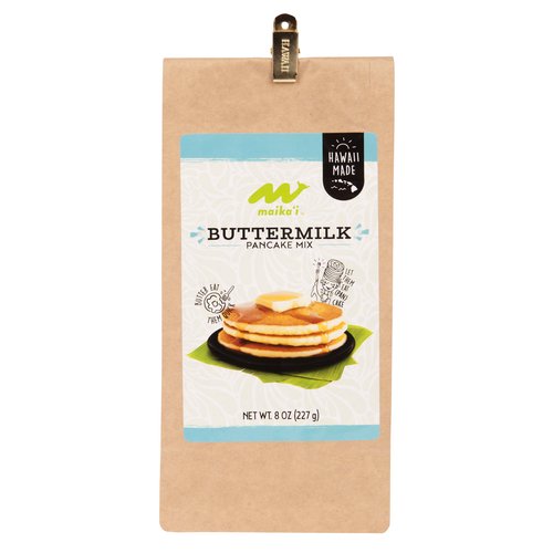 Our Maika`i Pancake Mixes are locally produced, easy to prepare and available in 3 island-inspired, natural flavors: Classic Buttermilk, Banana and Macadamia Nut flavors.<br><br>
Pair these fluffy pancakes with our locally-made Maika`i syrups for a true island-style breakfast.<br><br>
Easy to make, with a minimum amount of effort. Simply add liquid to our mix and serve up a stack of pancakes that are as light as air!<br><br>
Our Maika`i Pancake Mixes are great for gift-giving to family and friends on the mainland, as they’re easy to pack in your luggage or mail.