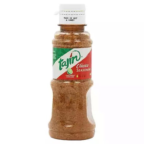 tajin mexican seasoning spice with fresh fruits 