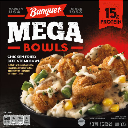 Since 1953. Meals made mega. Seasoned and breaded steak bites. Sprinkled with green beans, corn + shredded mozzarella cheese. Mashed potatoes + white gravy.