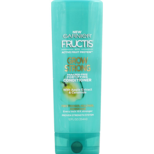 With active fruit protein. Paraben-free. For stronger, healthier shinier hair. Every inch 10x stronger. Proven strength system. New. Hair is almost entirely made up of protein, which gives hair its strength. All new, paraben-free Fructis formulas with Active Fruit Protein, an exclusive combination of citrus protein, vitamins B3 & B6, fruit & plant-derived extracts and strengthening conditioners, are designed for healthier, stronger hair. +active fruit protein. Grow Strong every inch 10x stronger with shampoo, conditioner & leave-in treatment. Our daily healthcare, with apple extract and ceramide, fortifies hair as it grows to bring life back to every inch: stronger, healthier & shinier. Fructis Cares: Paraben-free formula, gentle for everyday use. Vegan formula: no animal derived ingredients or byproducts. Bottle made or recyclable pet plastic with 50% post-consumer recycled waste. Produced in a facility committed to sustainability. Our zero-landfill site recovered 95% of its waste in 2015. Partnered with TerraCycle to keep beauty products out of landfills. Learn more at garnierUSA.com/green. SmartLabel: Scan for product information. www.garnierUSA.com. 1-800-4Garnier (1-800-442-7643). Please recycle this bottle to help decrease landfill waste. Made in USA of US and/or imported ingredients.